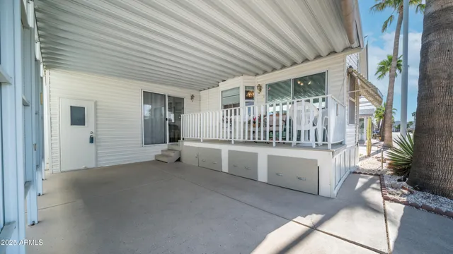 a view of balcony with a potted plant