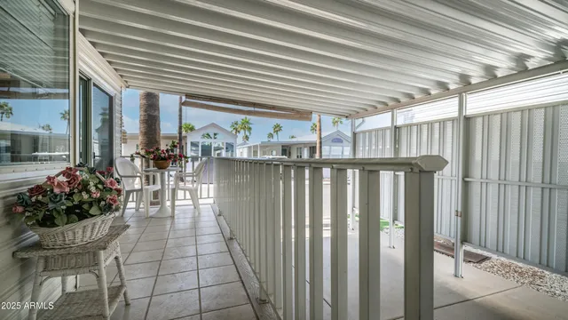 a view of a backyard with sitting area