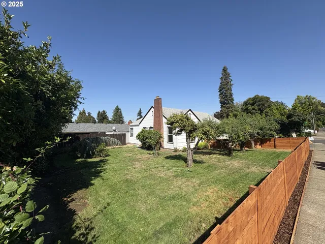 a view of a lake with a house