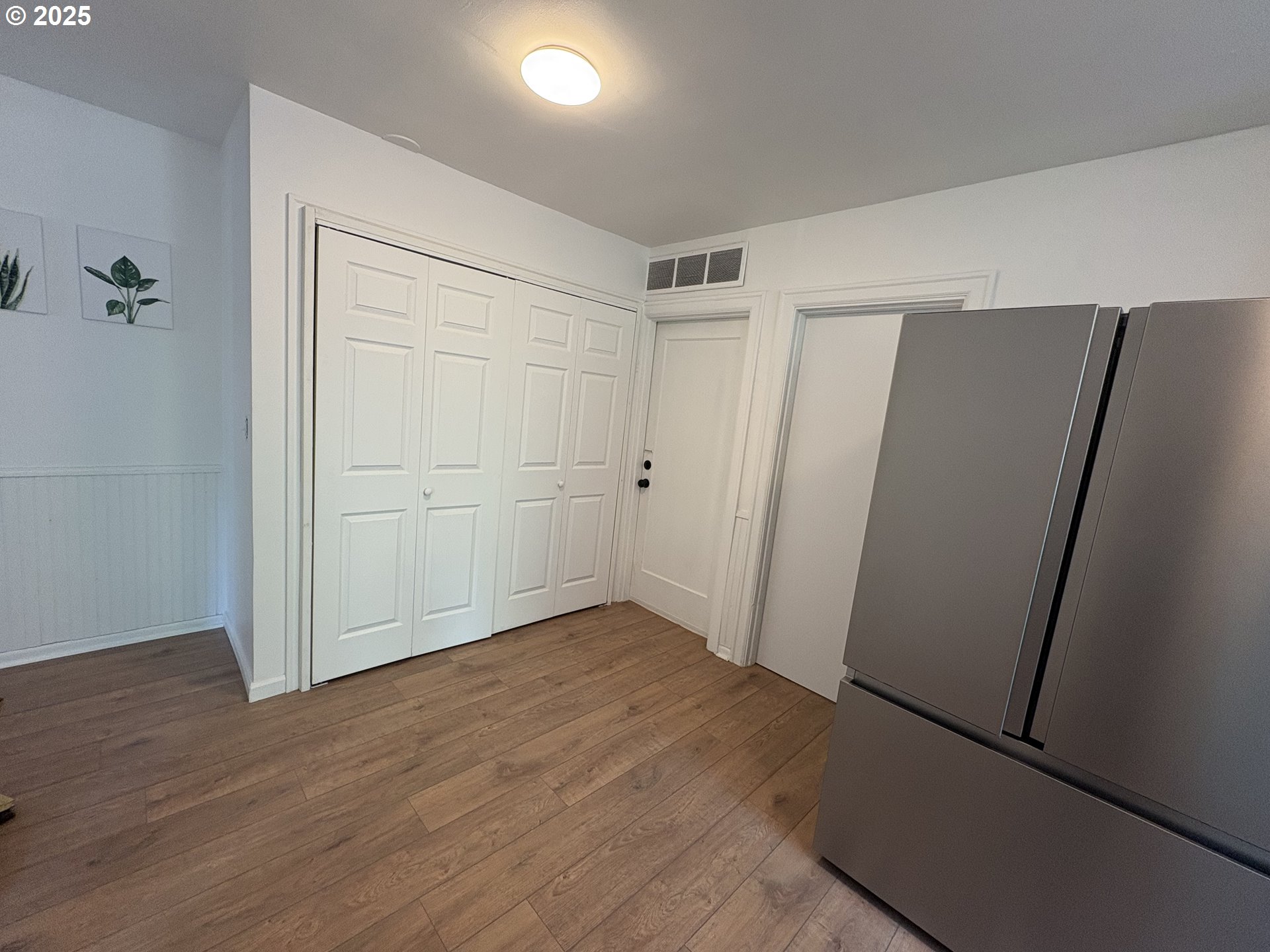 1510 Northwest Broadway Street Albany, OR 97321 - Photo 19 of 32 an empty room with wooden floor and closet