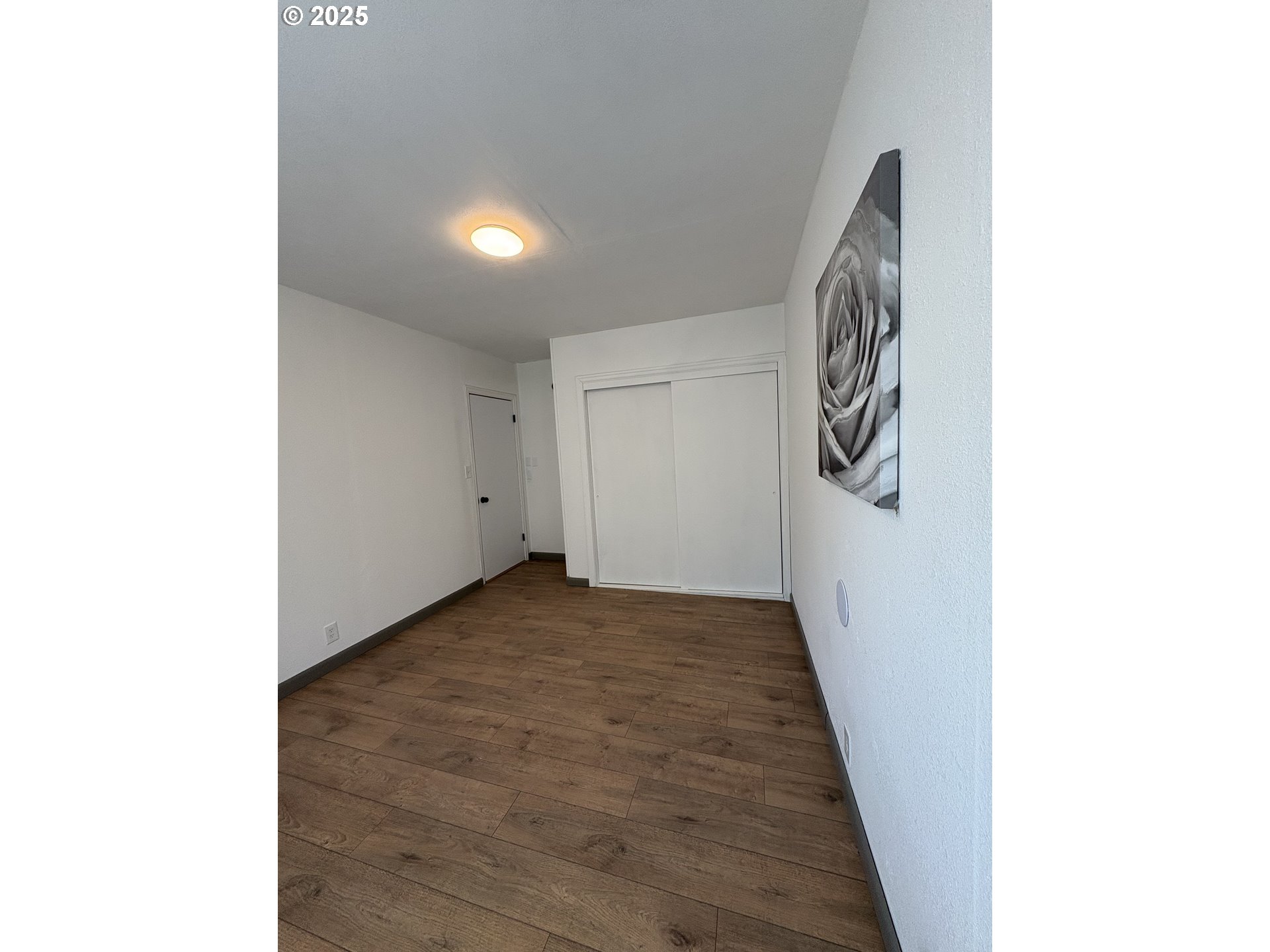 1510 Northwest Broadway Street Albany, OR 97321 - Photo 28 of 32 a view of a hallway with wooden floor