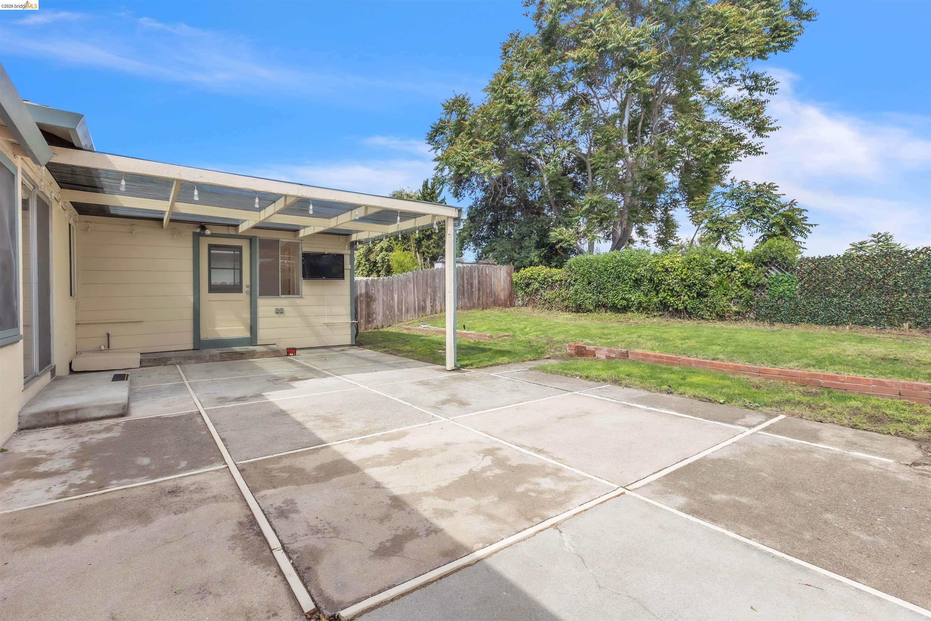 621 Paseo Del Rio San Lorenzo, CA 94580 - Photo 21 of 24 Expansive concrete patio featuring a partial overhead covering