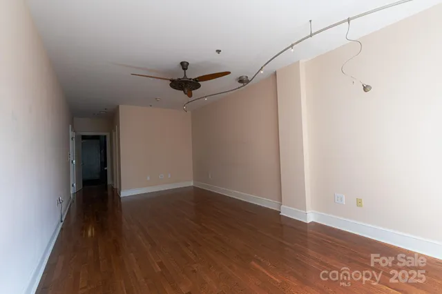 a view of a porch with wooden floor