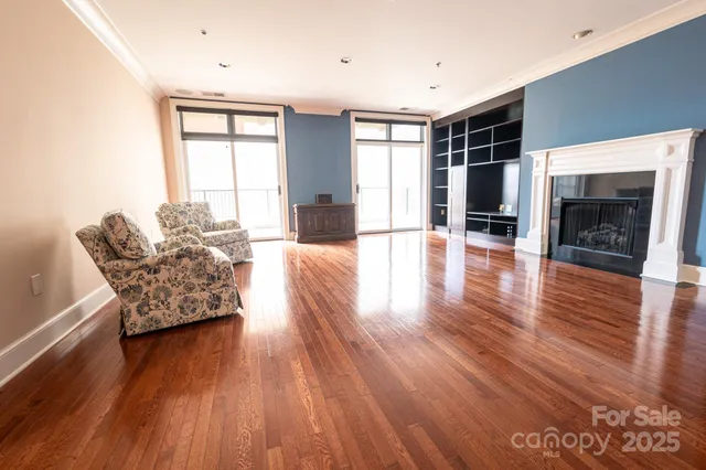 a kitchen with granite countertop a sink and cabinets