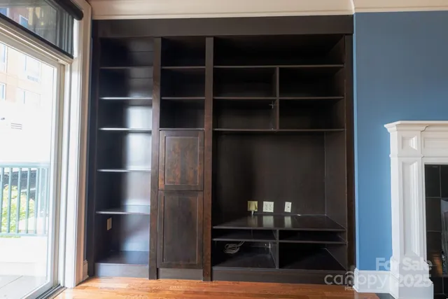 a kitchen with stainless steel appliances granite countertop a stove and a microwave
