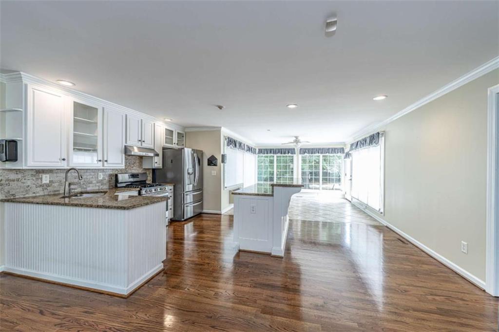 45 Wildflower Road Northeast Rome, GA 30161 - Photo 12 of 36 a view of kitchen with cabinets and wooden floor
