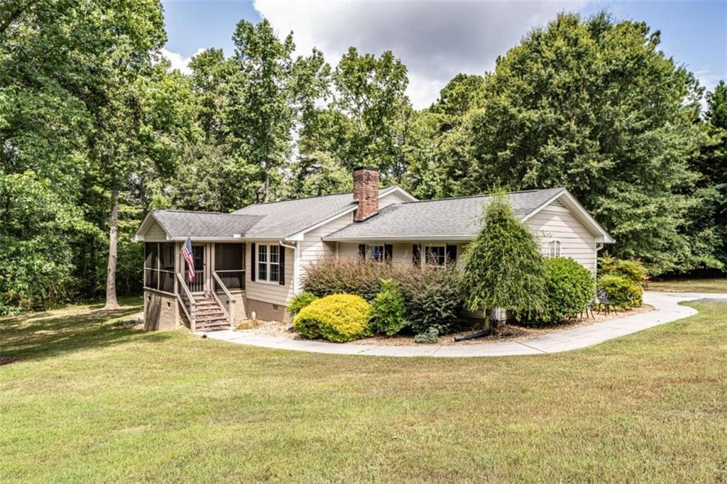 45 Wildflower Road Northeast Rome, GA 30161 - Photo 2 of 36 front view of a house with a yard