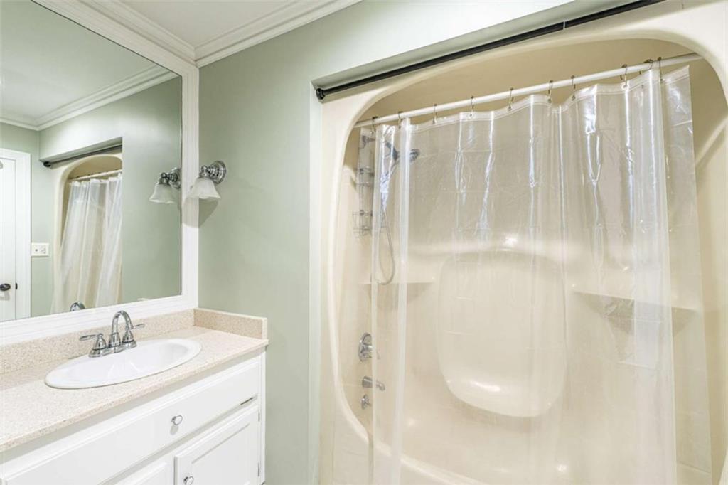 45 Wildflower Road Northeast Rome, GA 30161 - Photo 31 of 36 a bathroom with a granite countertop sink and a mirror