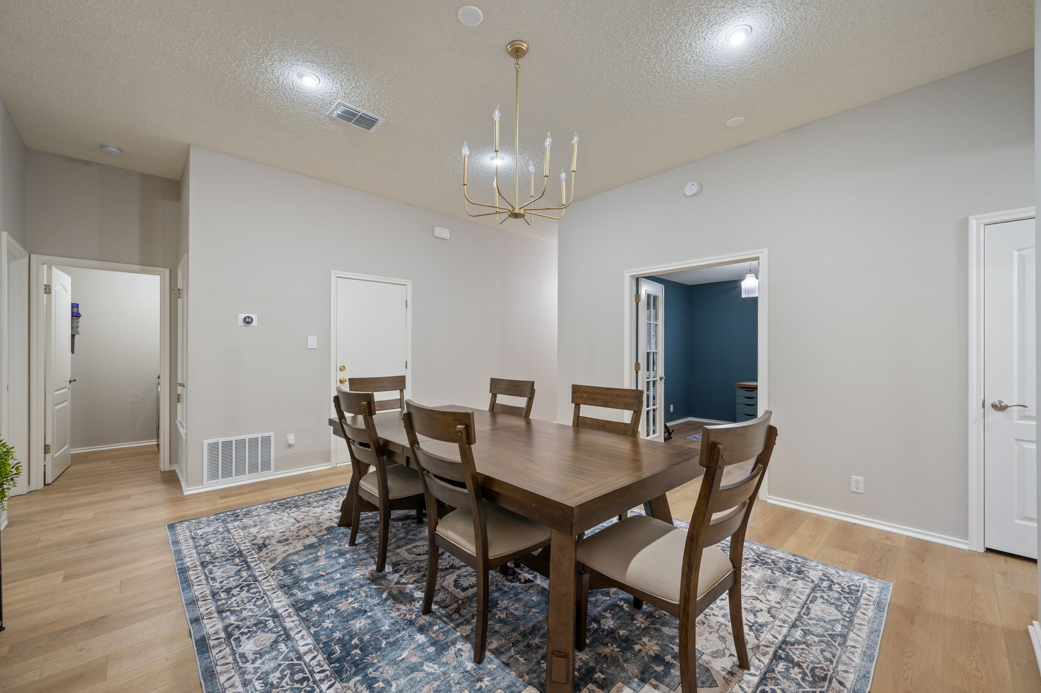 8509 Moose Cove Austin, TX 78749 - Photo 19 of 40 a view of a dining room with furniture and wooden floor