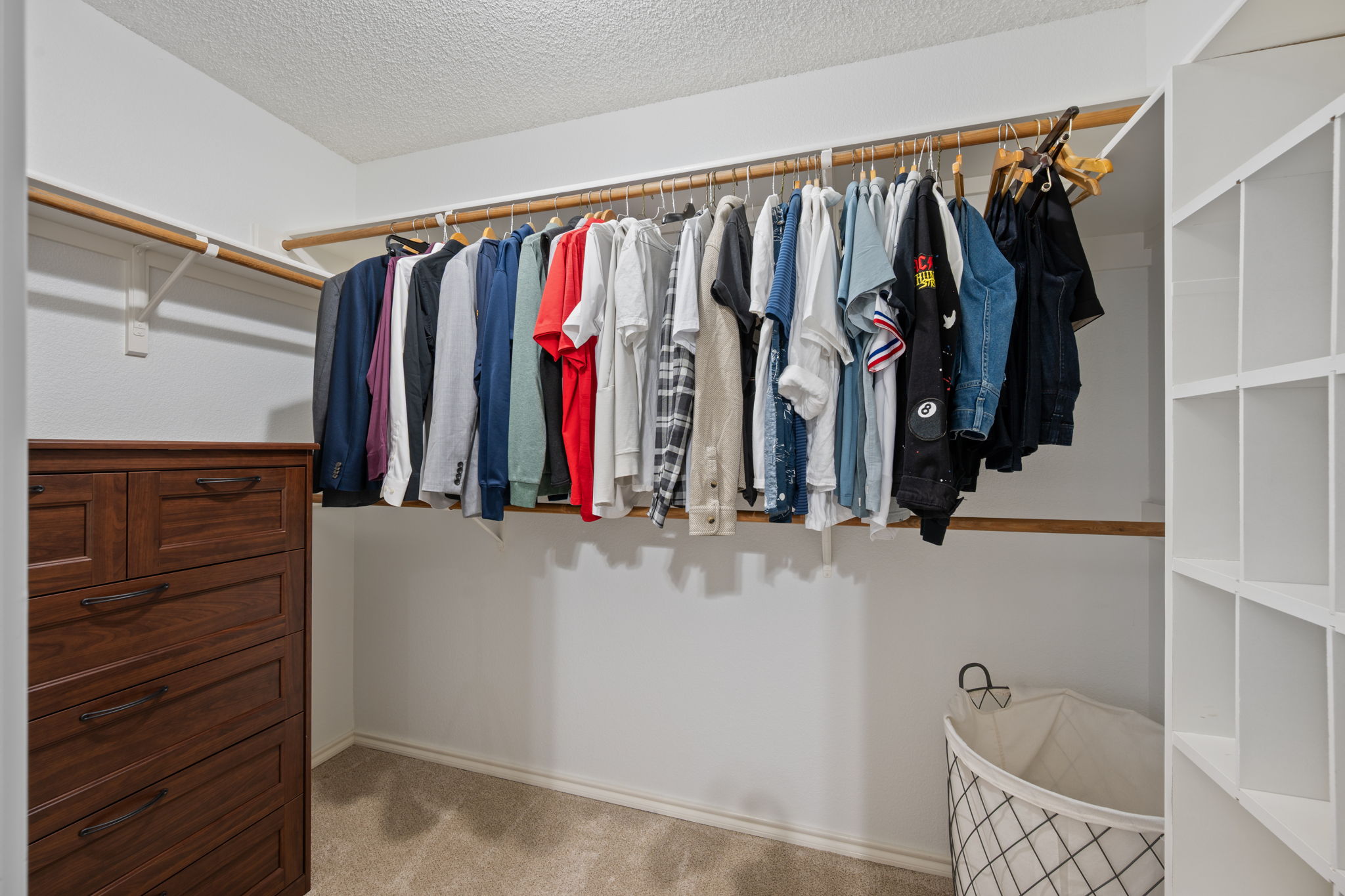 8509 Moose Cove Austin, TX 78749 - Photo 25 of 40 a view of walk in closet with clothes