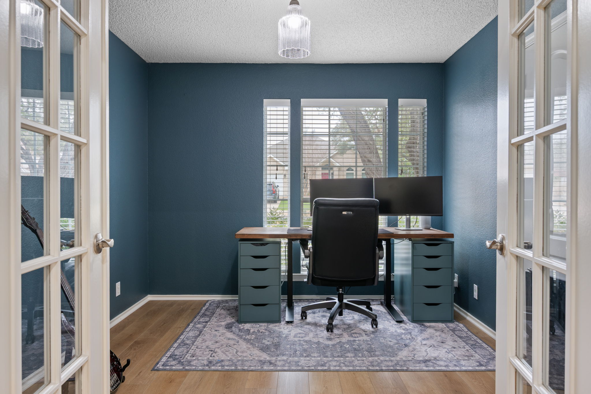 8509 Moose Cove Austin, TX 78749 - Photo 27 of 40 a view of a workspace with furniture and a window