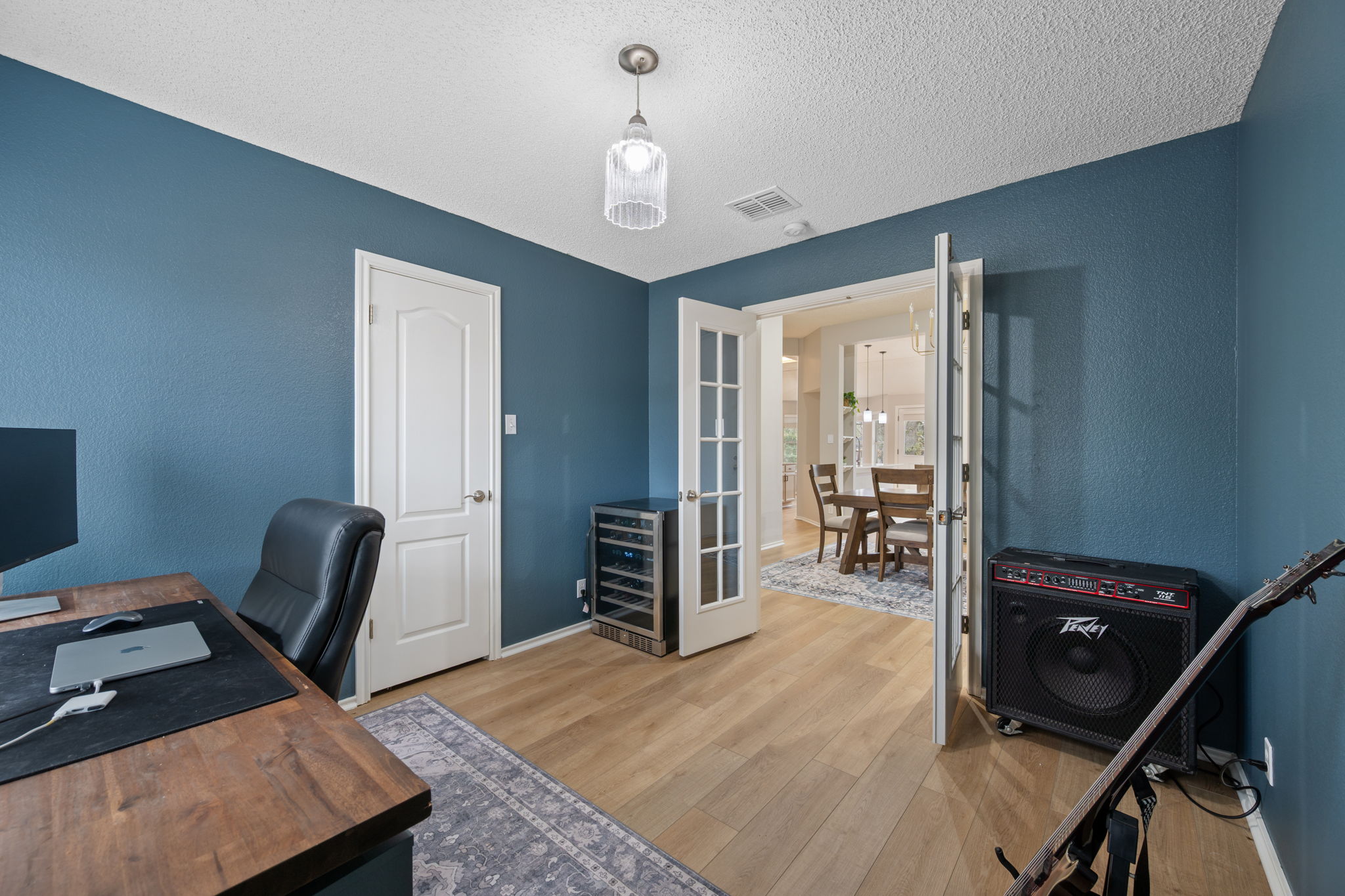8509 Moose Cove Austin, TX 78749 - Photo 28 of 40 a room with furniture and a wooden floor
