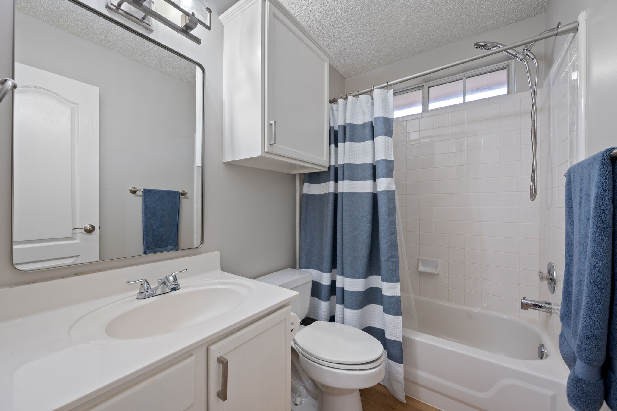 8509 Moose Cove Austin, TX 78749 - Photo 31 of 40 a bathroom with a sink toilet and shower