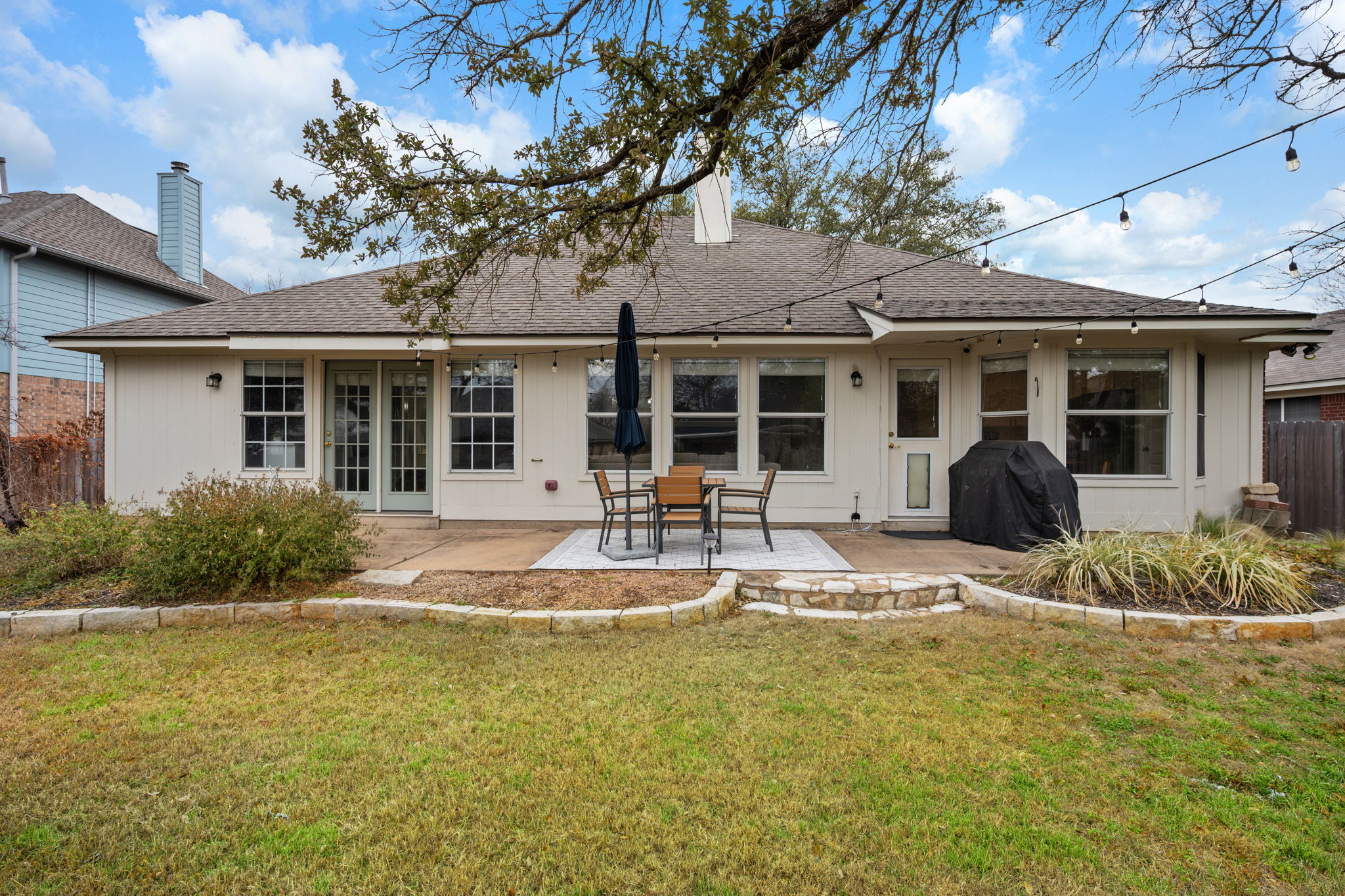 8509 Moose Cove Austin, TX 78749 - Photo 36 of 40 a front view of a house with garden