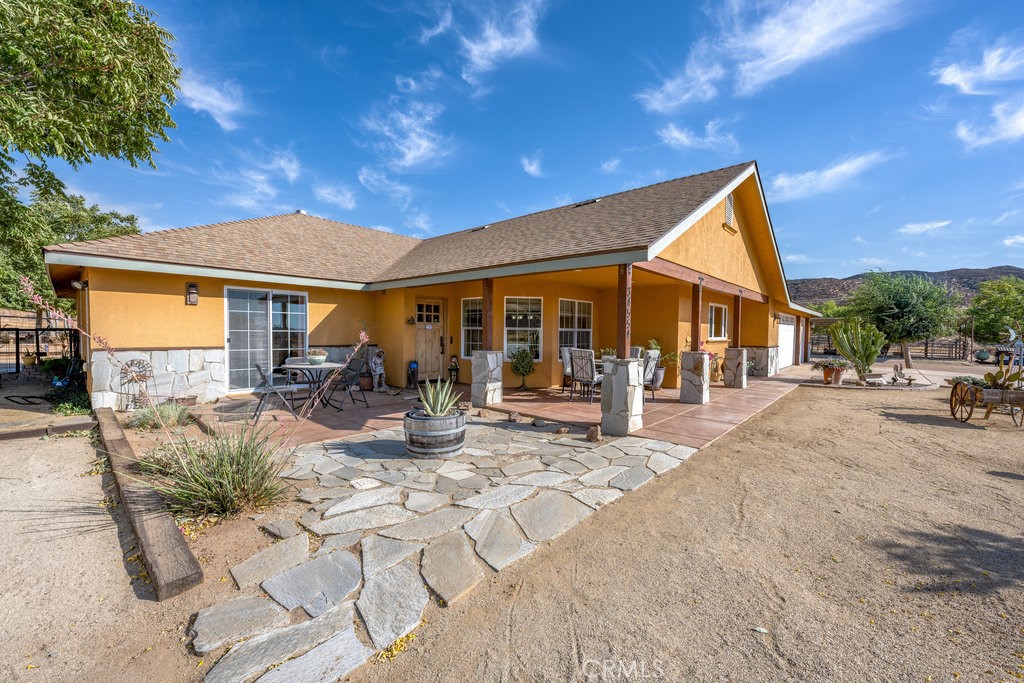 34554 Koontz Road Agua Dulce, CA 91390 - Photo 1 of 33 a view of the house with backyard porch and sitting area