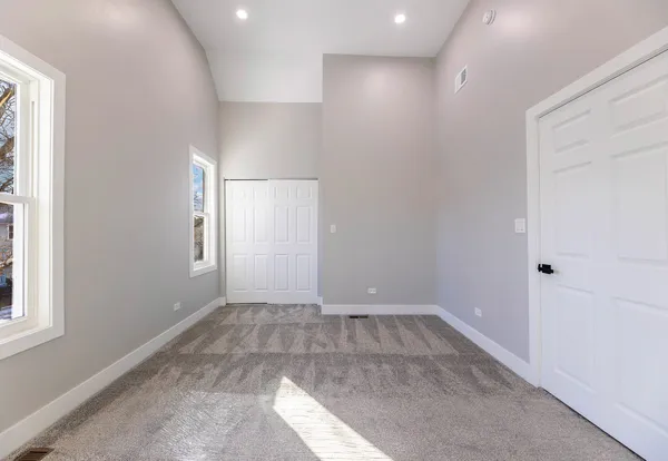 an empty room with windows