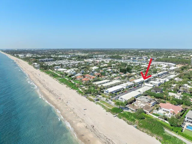 an aerial view of beach and ocean
