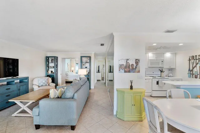 a very nice looking dining room with a table and chairs