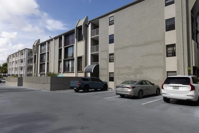 a car parked in front of a building