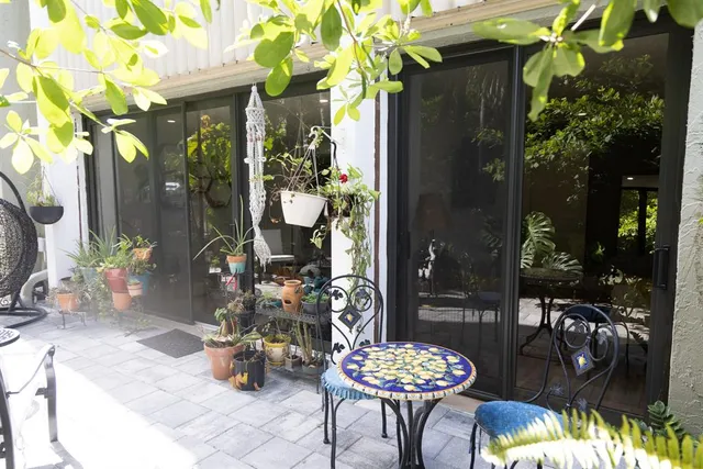 a front view of a house with patio
