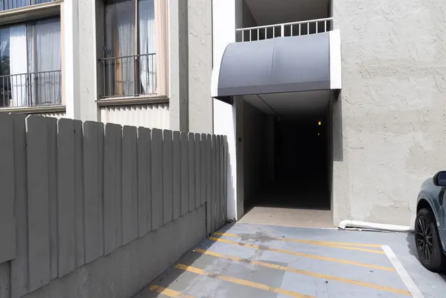 a car parked in front of a building