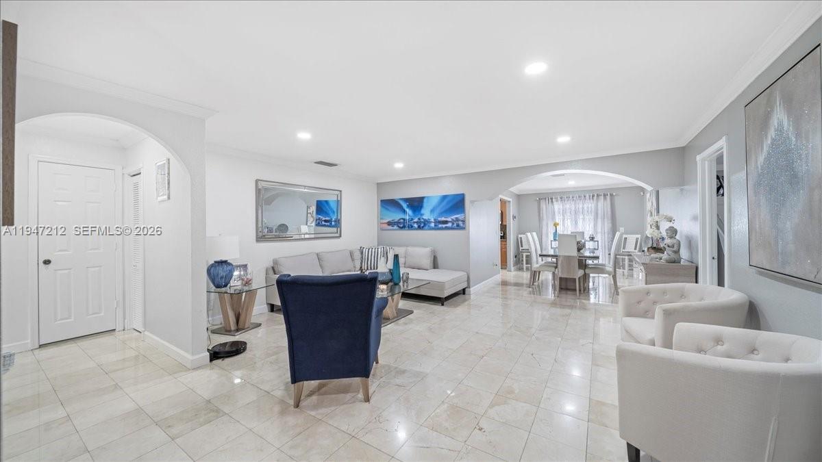 13430 Southwest 25th Street Miami, FL 33175 - Photo 13 of 49 a living room with furniture and wooden floor