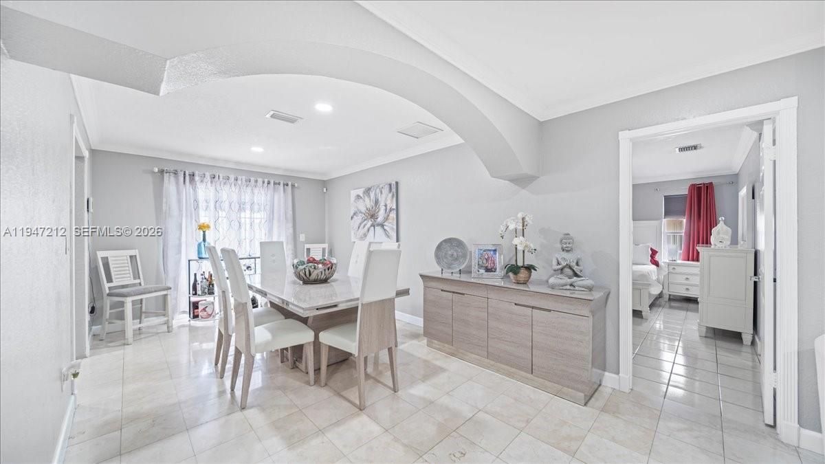 13430 Southwest 25th Street Miami, FL 33175 - Photo 29 of 49 a room with furniture and entryway