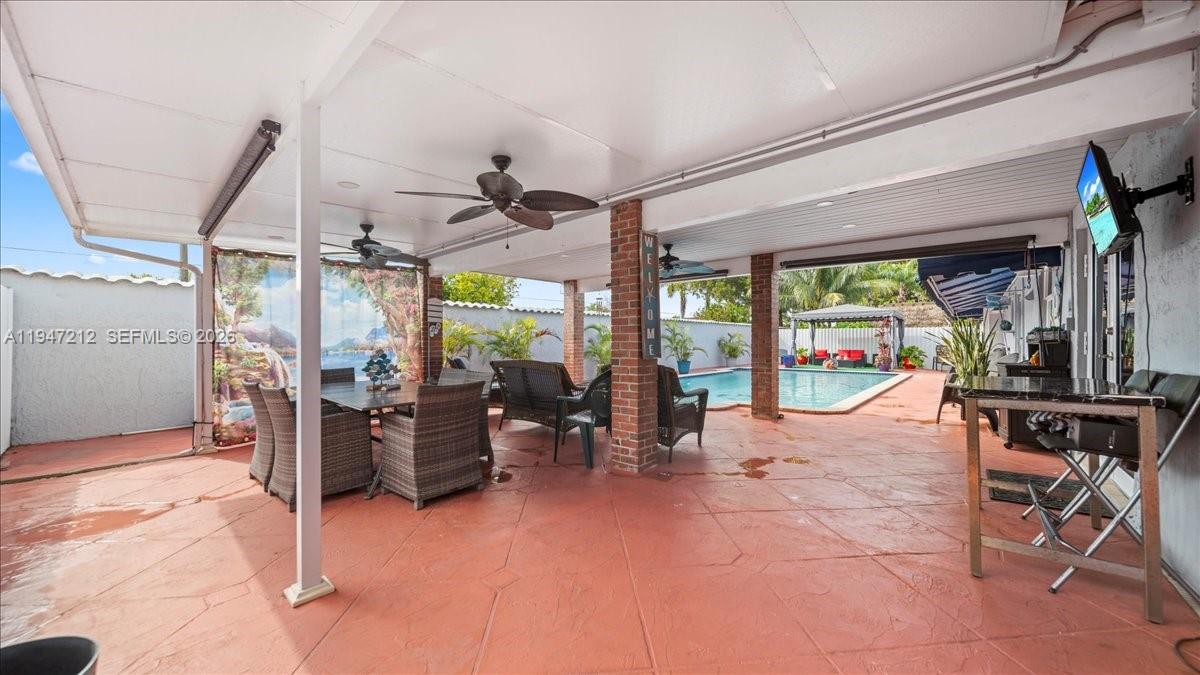 13430 Southwest 25th Street Miami, FL 33175 - Photo 41 of 49 a living room with patio furniture