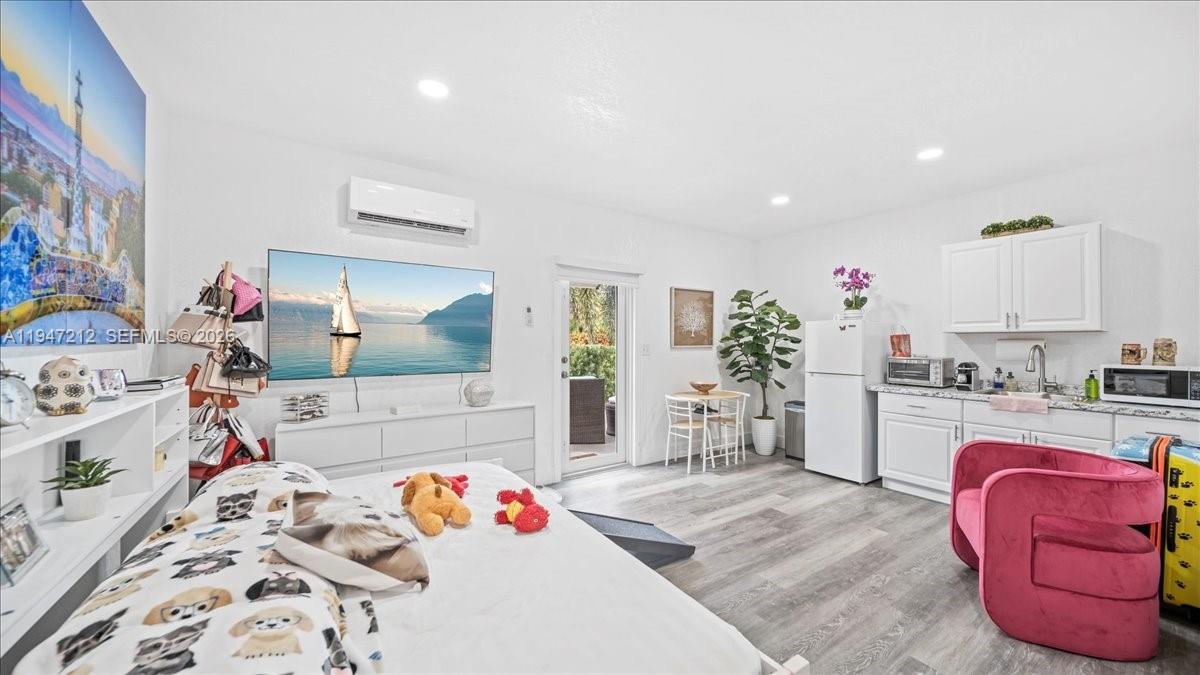 13430 Southwest 25th Street Miami, FL 33175 - Photo 9 of 49 a kitchen with a sink and cabinets