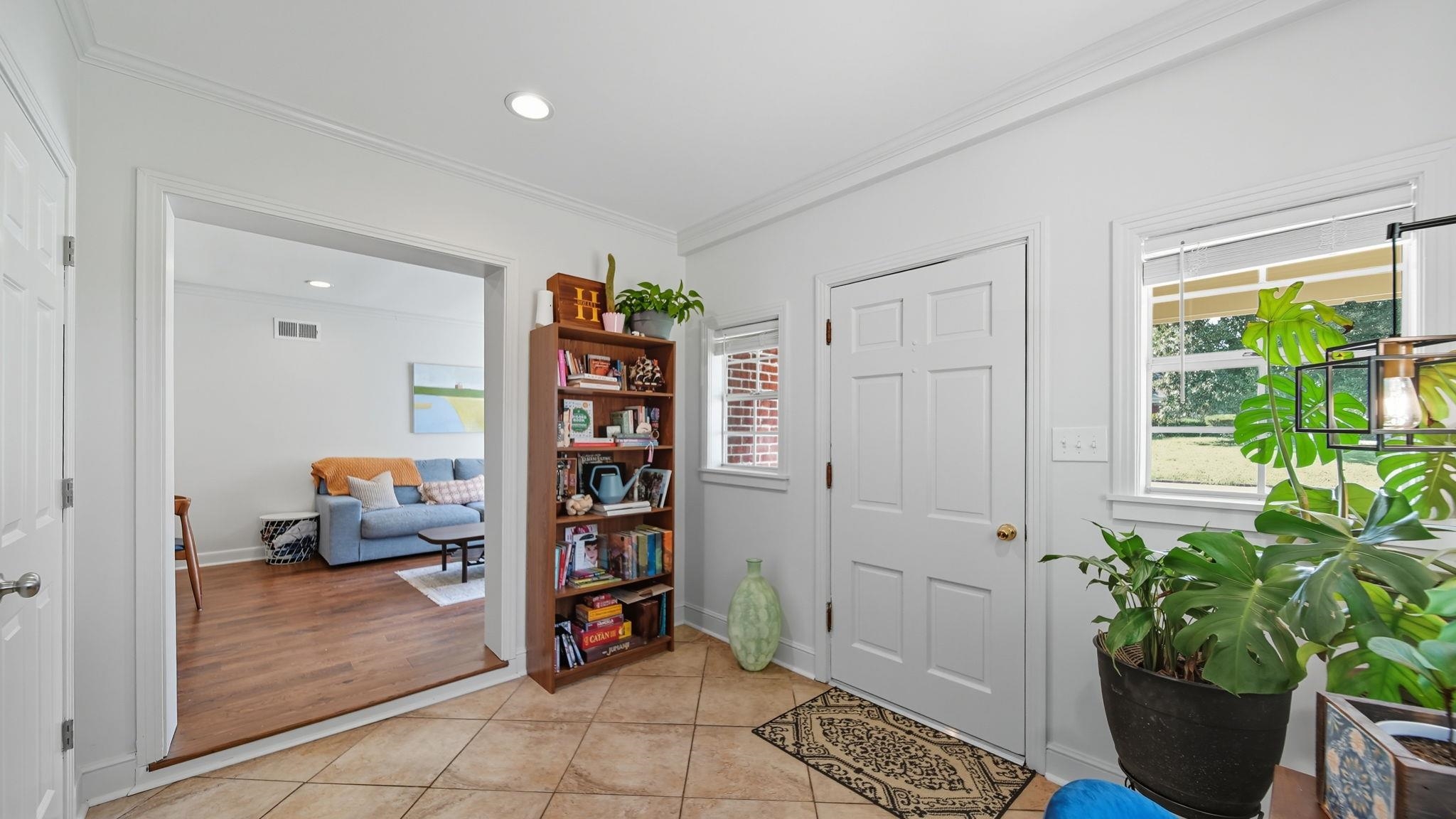 678 Moss Road Memphis, TN 38117 - Photo 19 of 33 Foyer with crown molding, light tile patterned floors, and recessed lighting