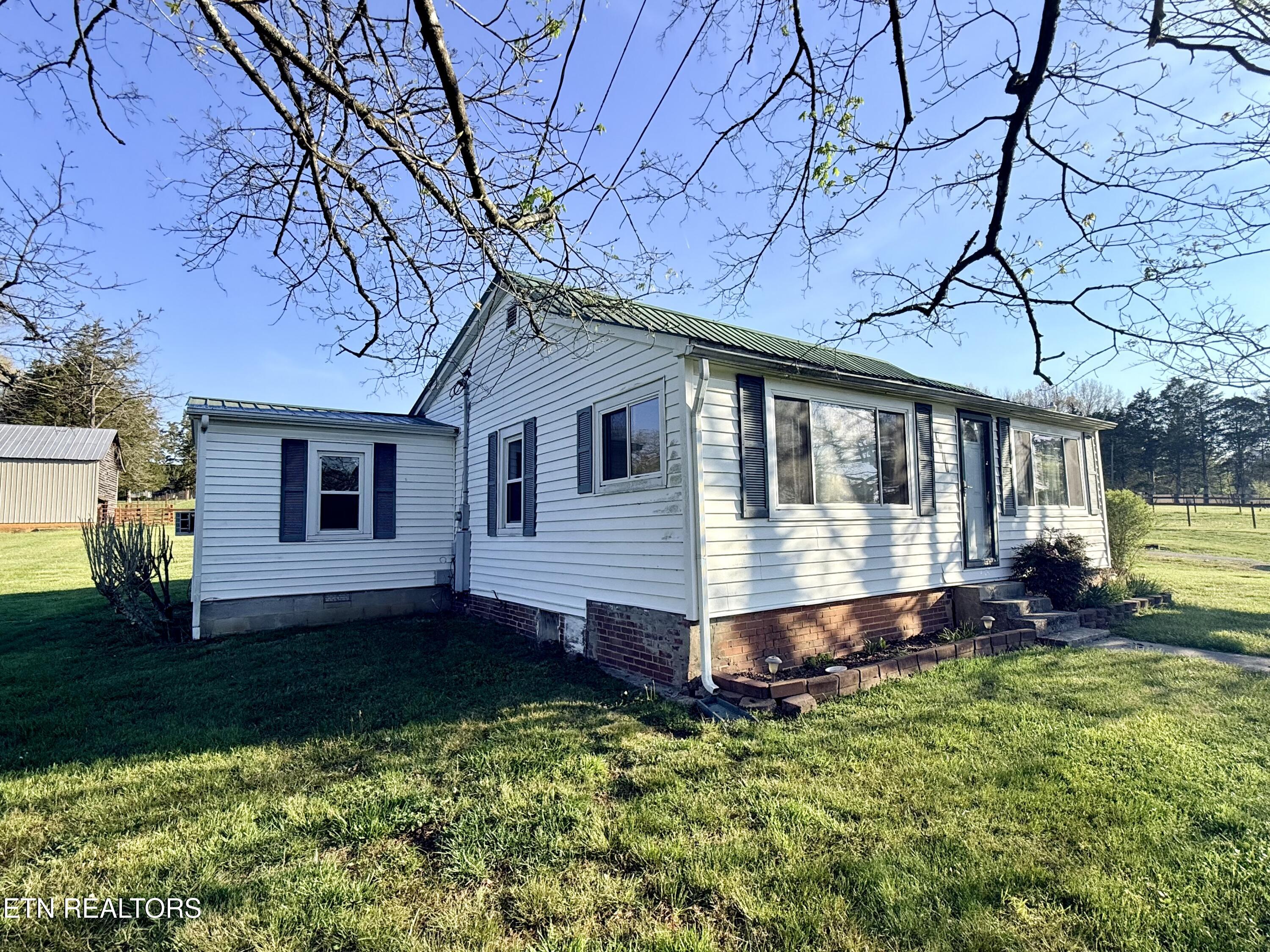 8259 Corryton Luttrell Road Plainview, TN 37721 - Photo 2 of 16 13D0FE4A-B804-49F1-BAFA-FBF996A79408_1_2