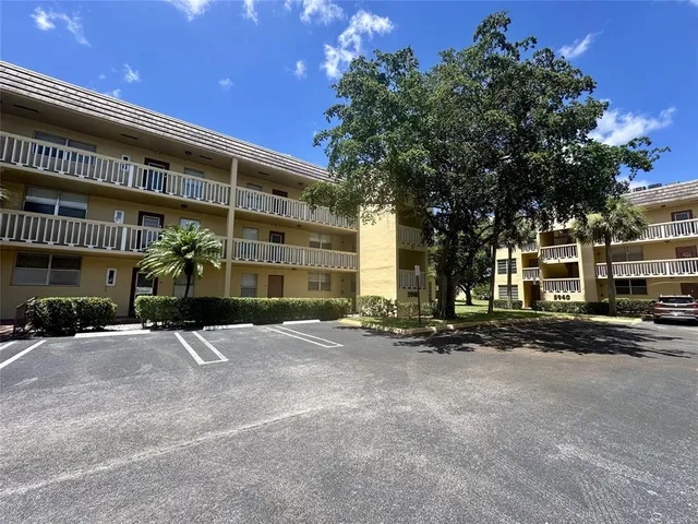 a front view of a building with street view
