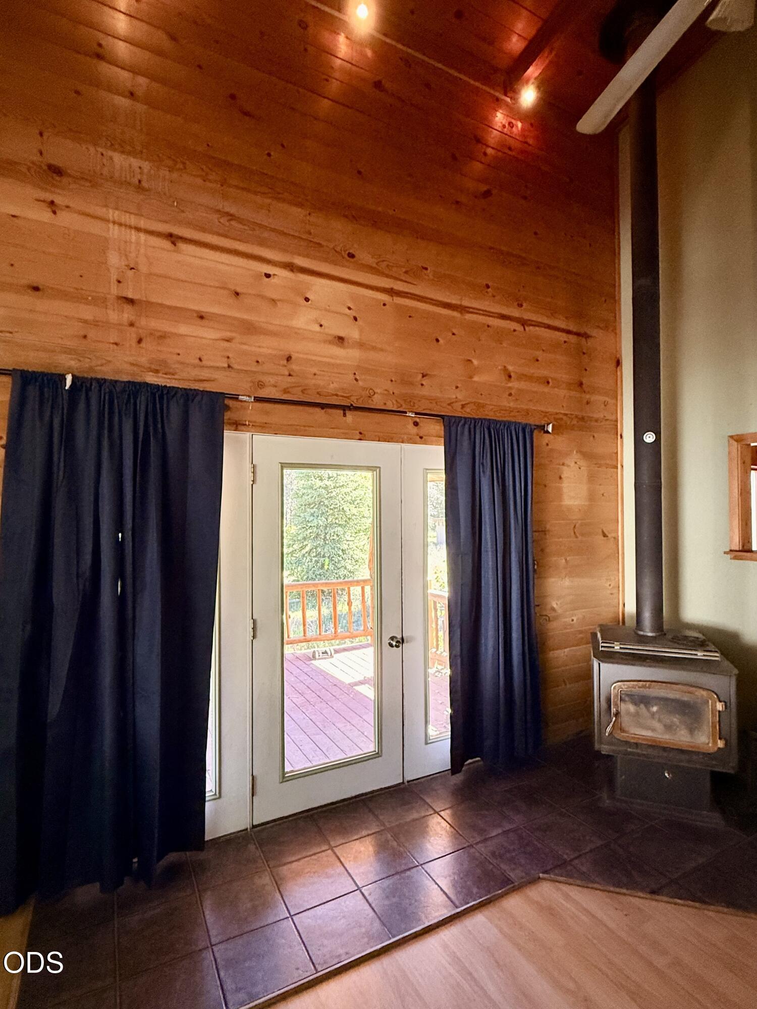 16025 Strawn Road La Pine, OR 97739 - Photo 12 of 95 a view of front door with wooden floor and stairs