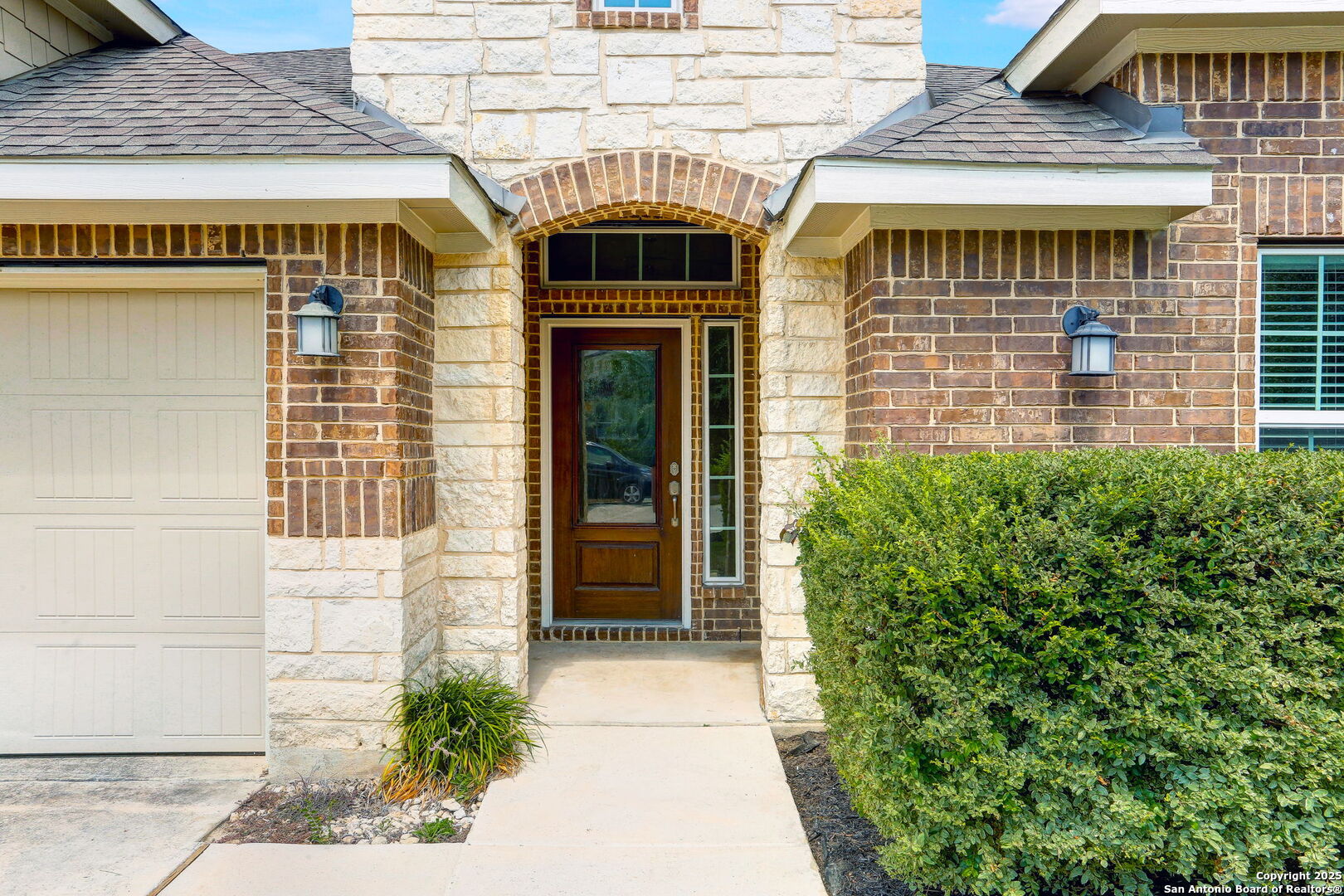 9825 Jon Boat Way Boerne, TX 78006 - Photo 1 of 24 a front view of a house with a yard