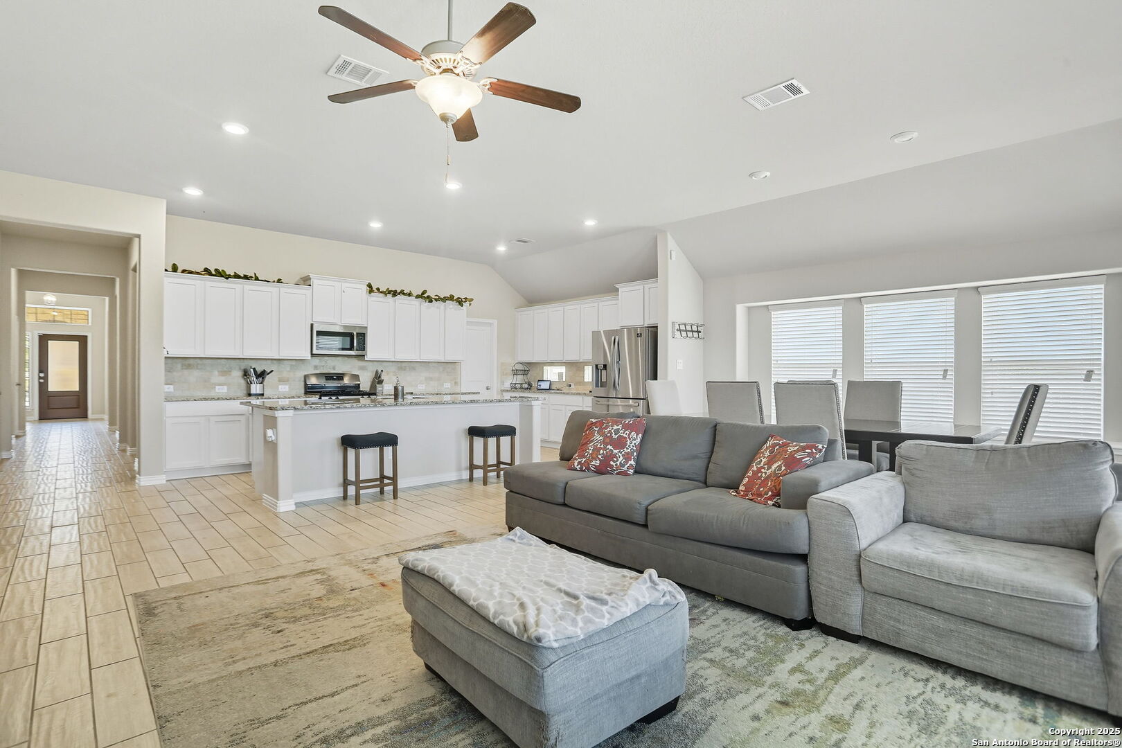 9825 Jon Boat Way Boerne, TX 78006 - Photo 11 of 24 a living room with furniture and kitchen view