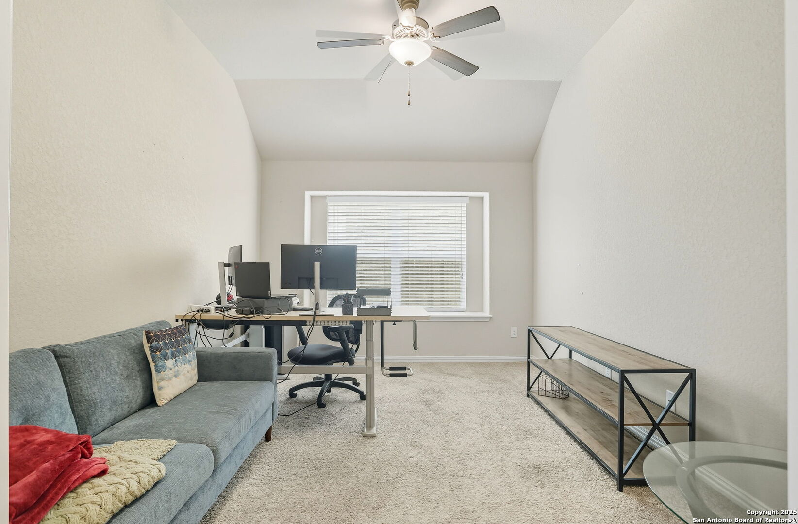 9825 Jon Boat Way Boerne, TX 78006 - Photo 16 of 24 a living room with furniture and a window