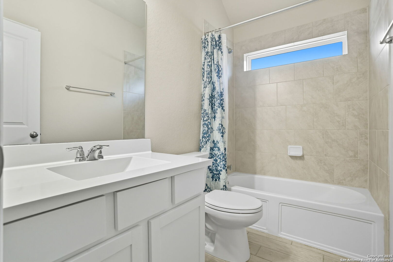 9825 Jon Boat Way Boerne, TX 78006 - Photo 21 of 24 a bathroom with a sink a toilet and a bathtub