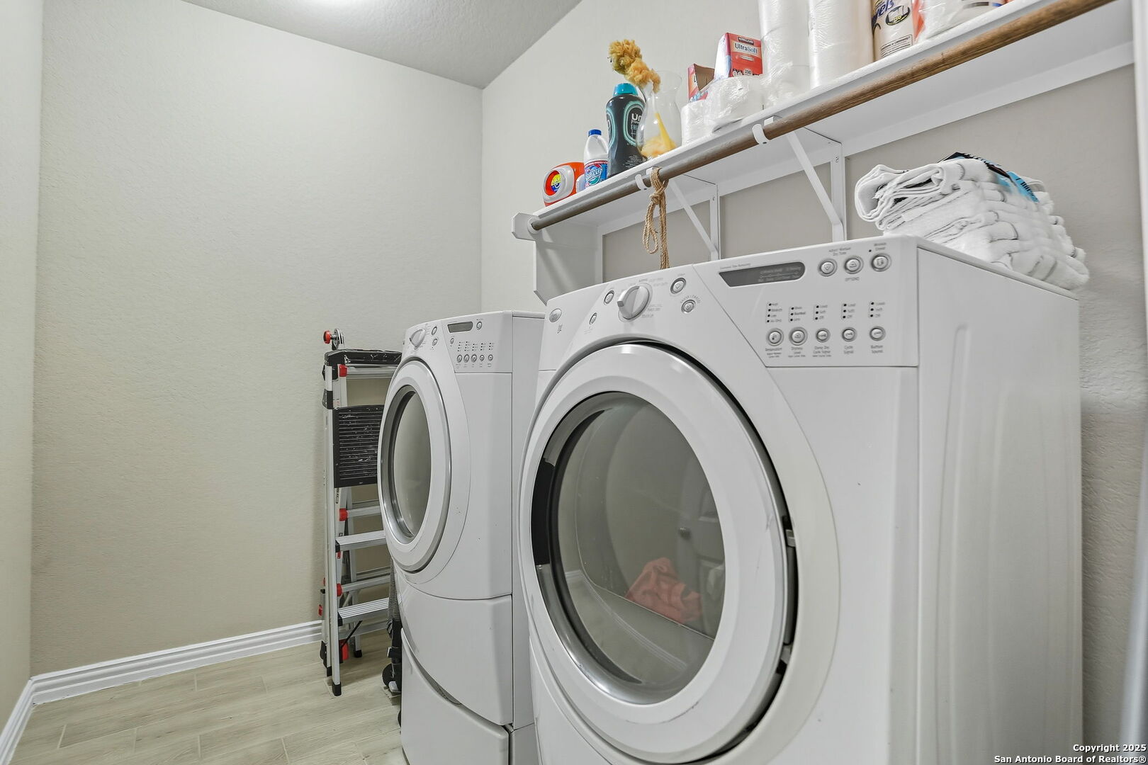 9825 Jon Boat Way Boerne, TX 78006 - Photo 22 of 24 a utility room with dryer and washer