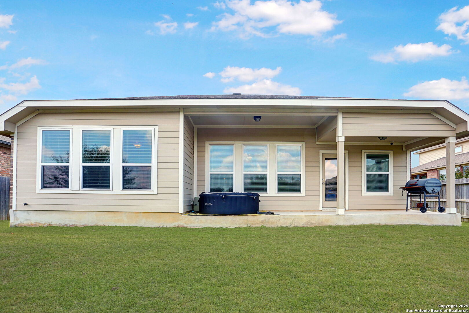 9825 Jon Boat Way Boerne, TX 78006 - Photo 24 of 24 a front view of a house with a garden