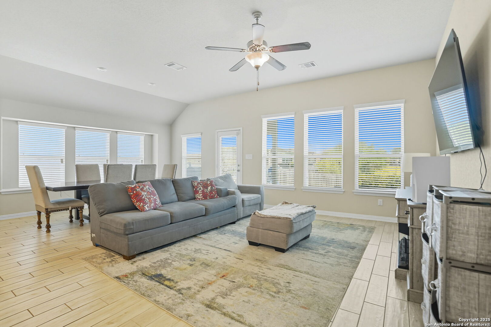 9825 Jon Boat Way Boerne, TX 78006 - Photo 10 of 24 a living room with furniture and a flat screen tv