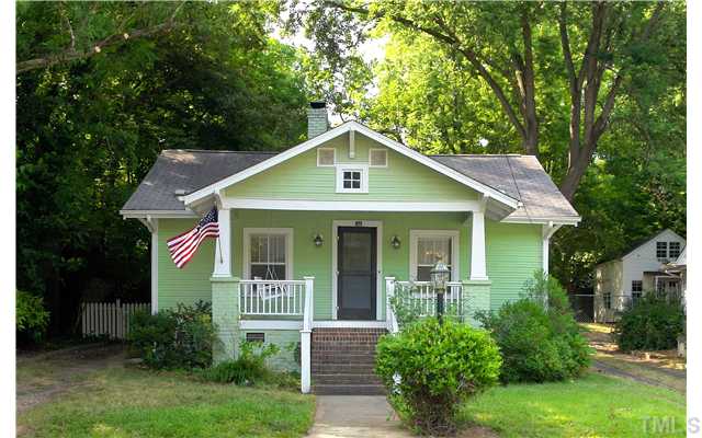 124 Hudson Street Raleigh, NC 27608 - Photo 19 of 19 a front view of a house with garden