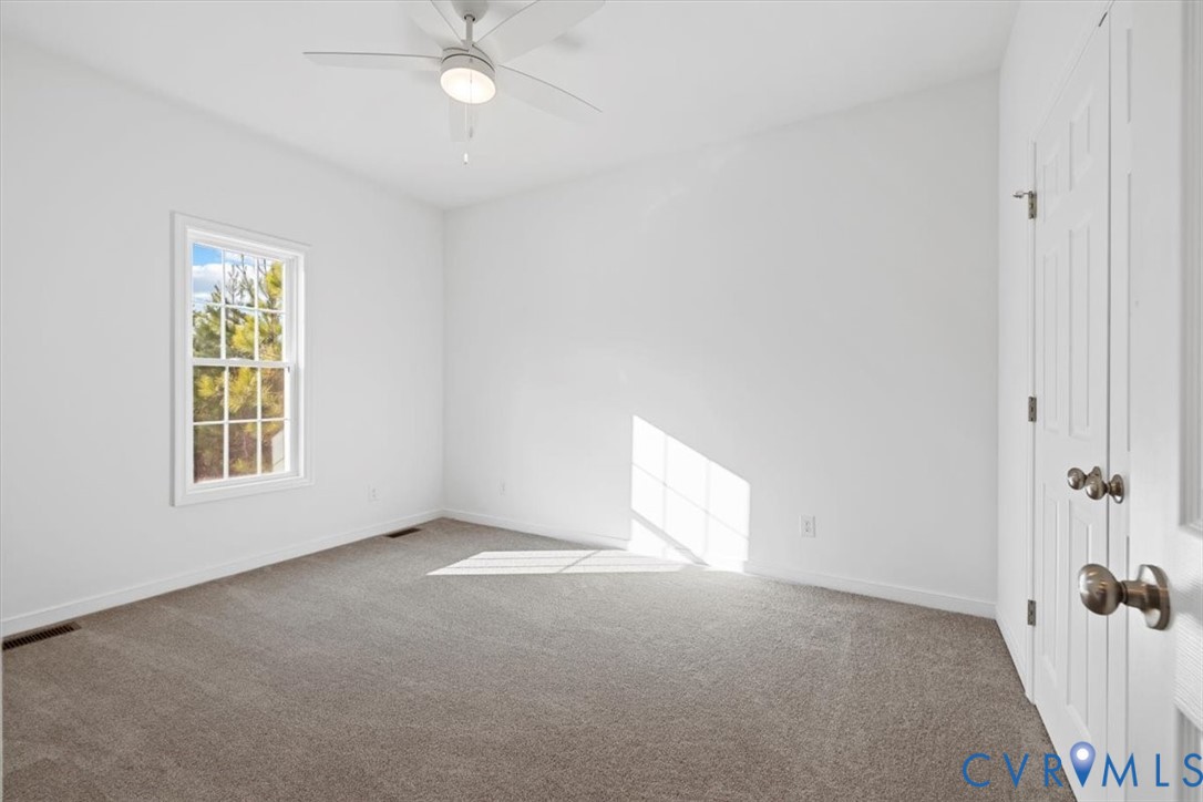 170 Barter Hill Road Cumberland, VA 23040 - Photo 26 of 42 Bedroom featuring carpet floors and ceiling fan