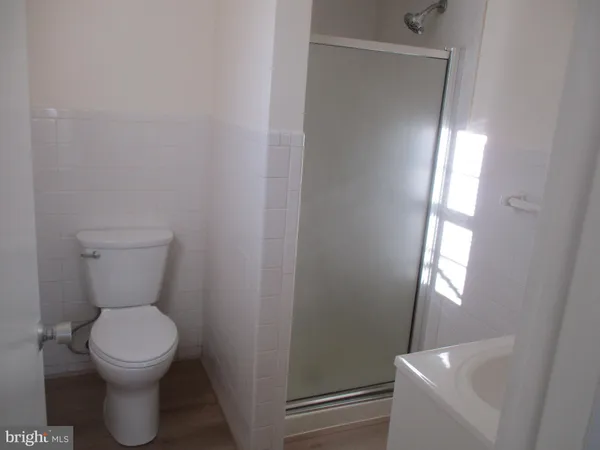 a bathroom with a toilet and a sink