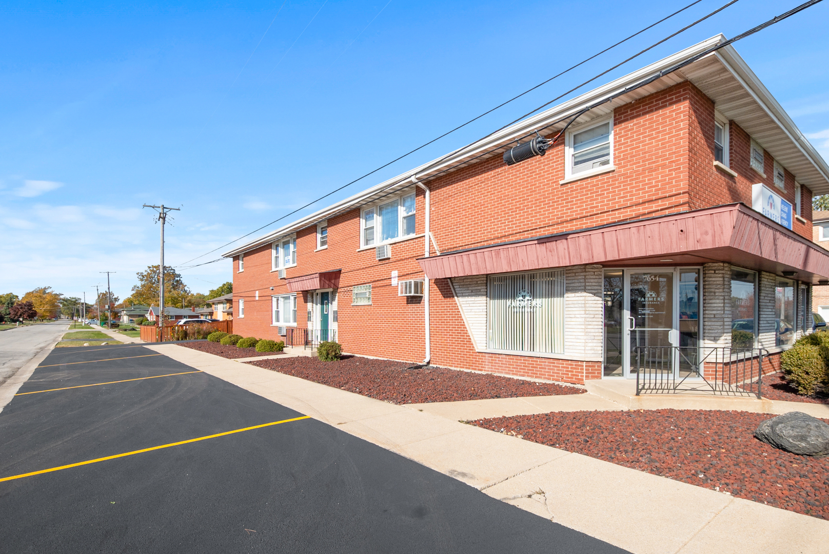 a front view of a building with street
