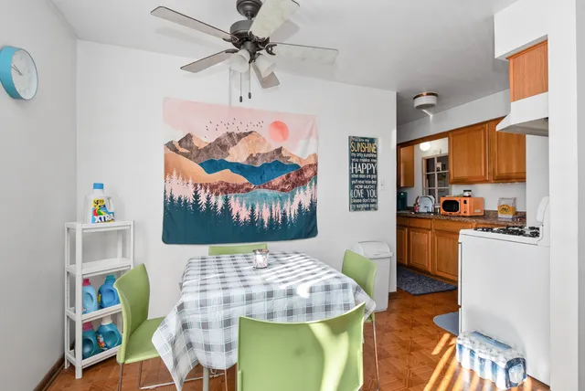 a kitchen that has a sink and a stove