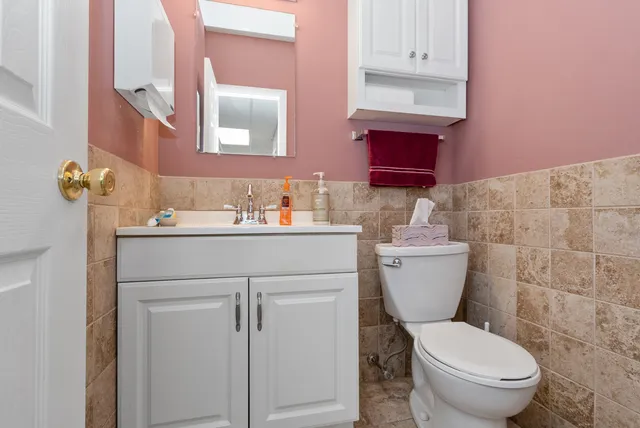 a workspace with furniture and chandelier