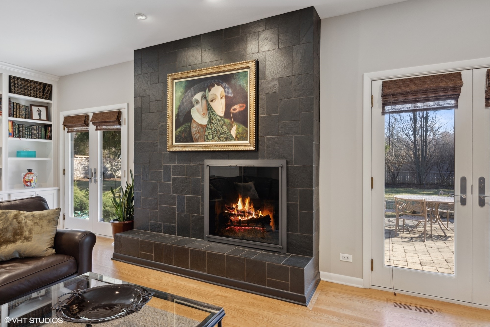 920 Pine Tree Lane Winnetka, IL 60093 - Photo 13 of 59 a living room with furniture and a fireplace
