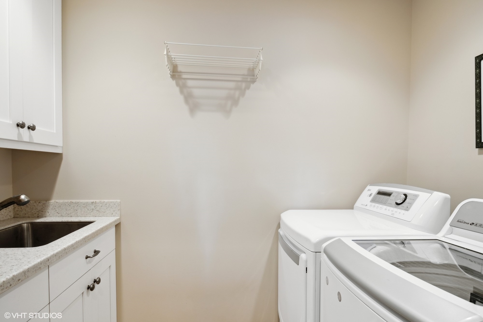 920 Pine Tree Lane Winnetka, IL 60093 - Photo 25 of 59 a utility room with dryer and washer