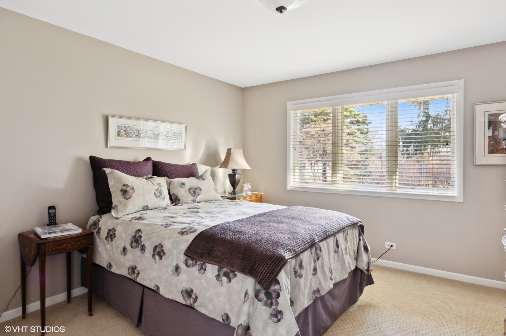 920 Pine Tree Lane Winnetka, IL 60093 - Photo 30 of 59 a bedroom with a bed a table and windows