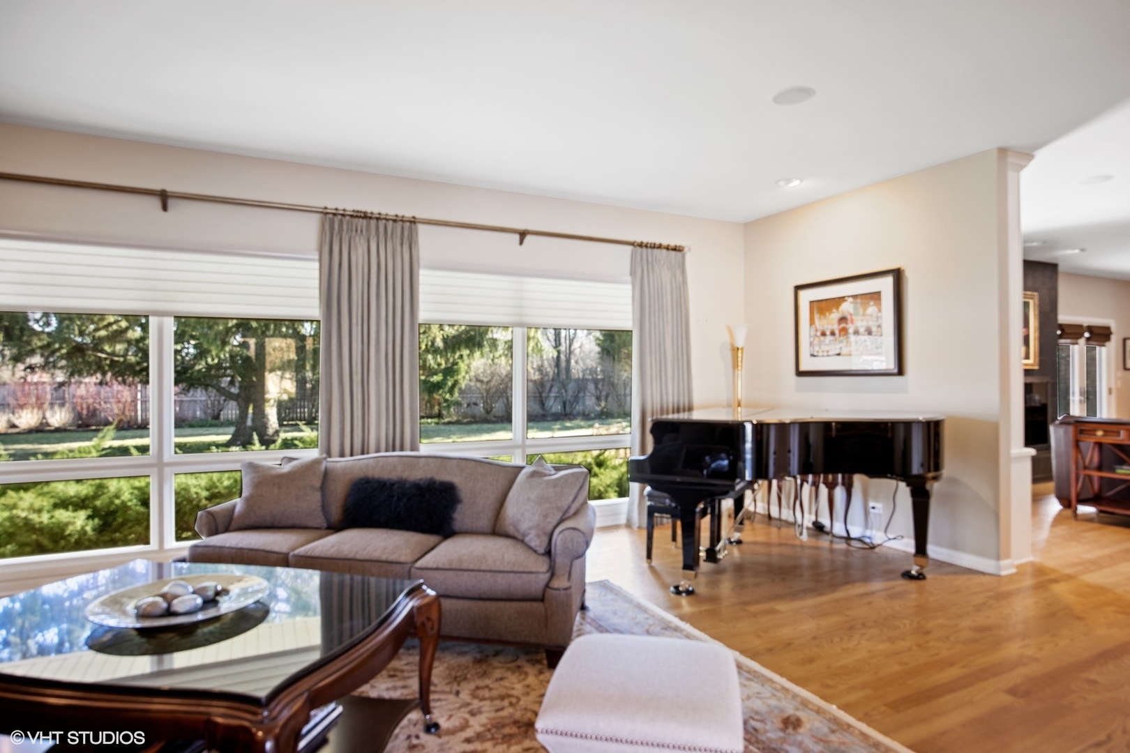 920 Pine Tree Lane Winnetka, IL 60093 - Photo 7 of 59 a living room with furniture and floor to ceiling windows